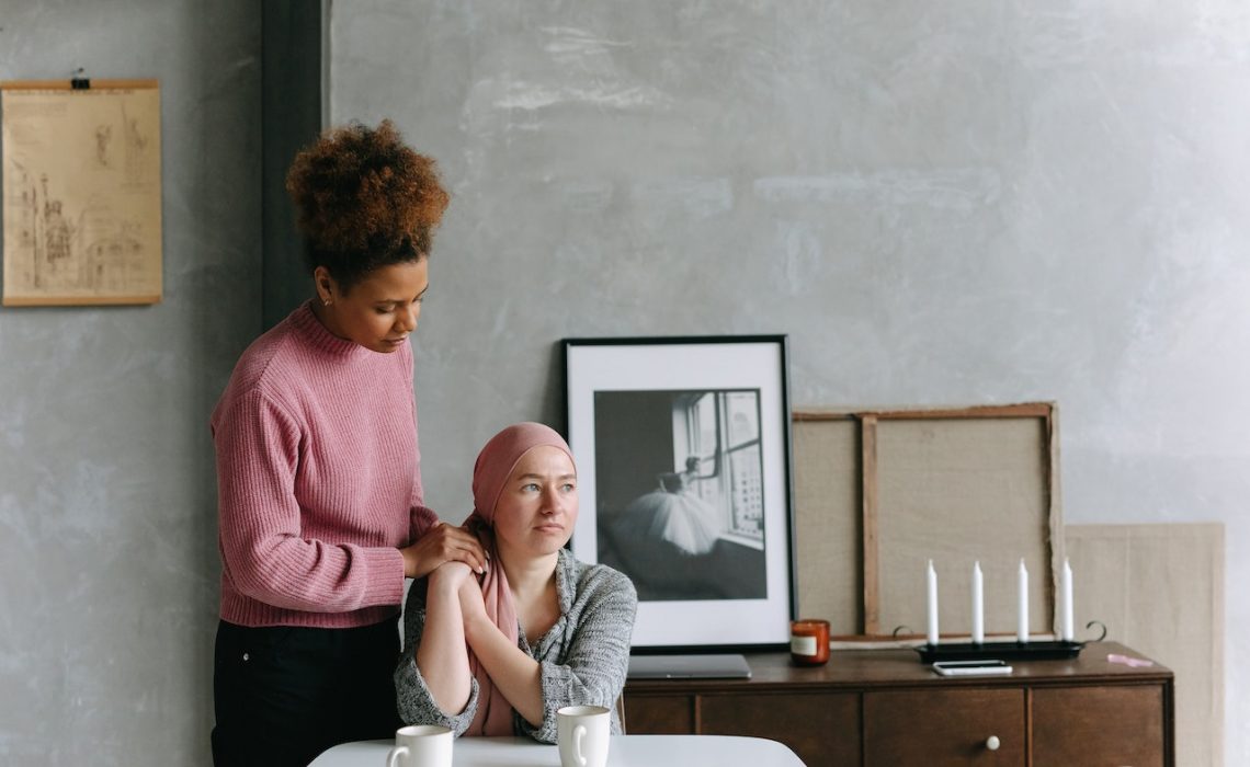 A Woman helping her friend with cancer