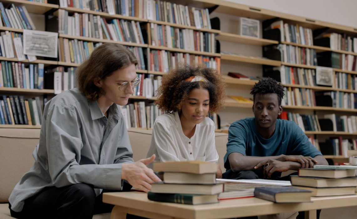 students studying inside a library