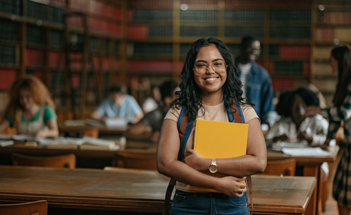 Beautiful Indian female student portrait while looking at camera