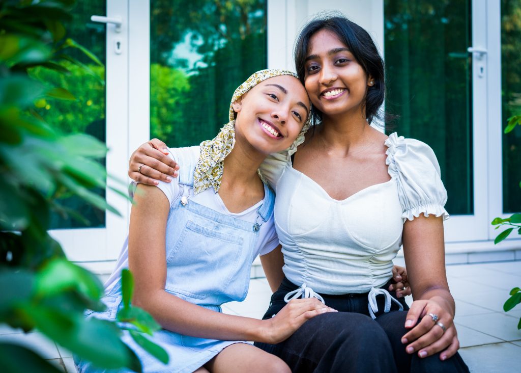 Group Portrait of sisters smiling at the camera