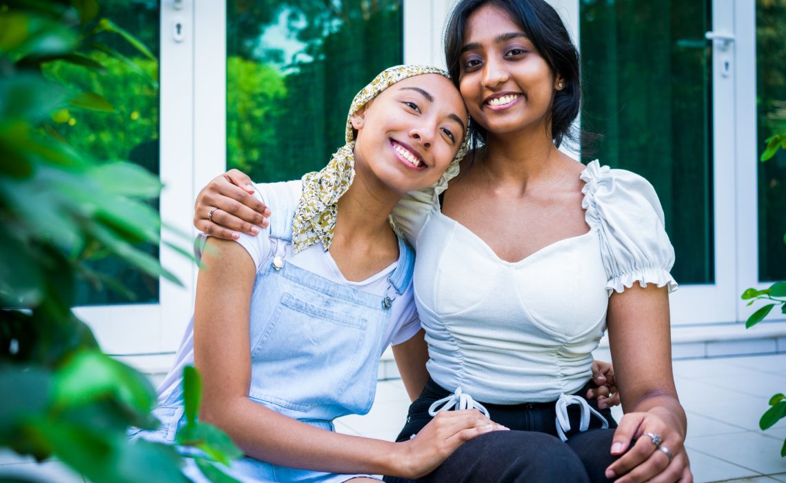 Group Portrait of sisters smiling at the camera