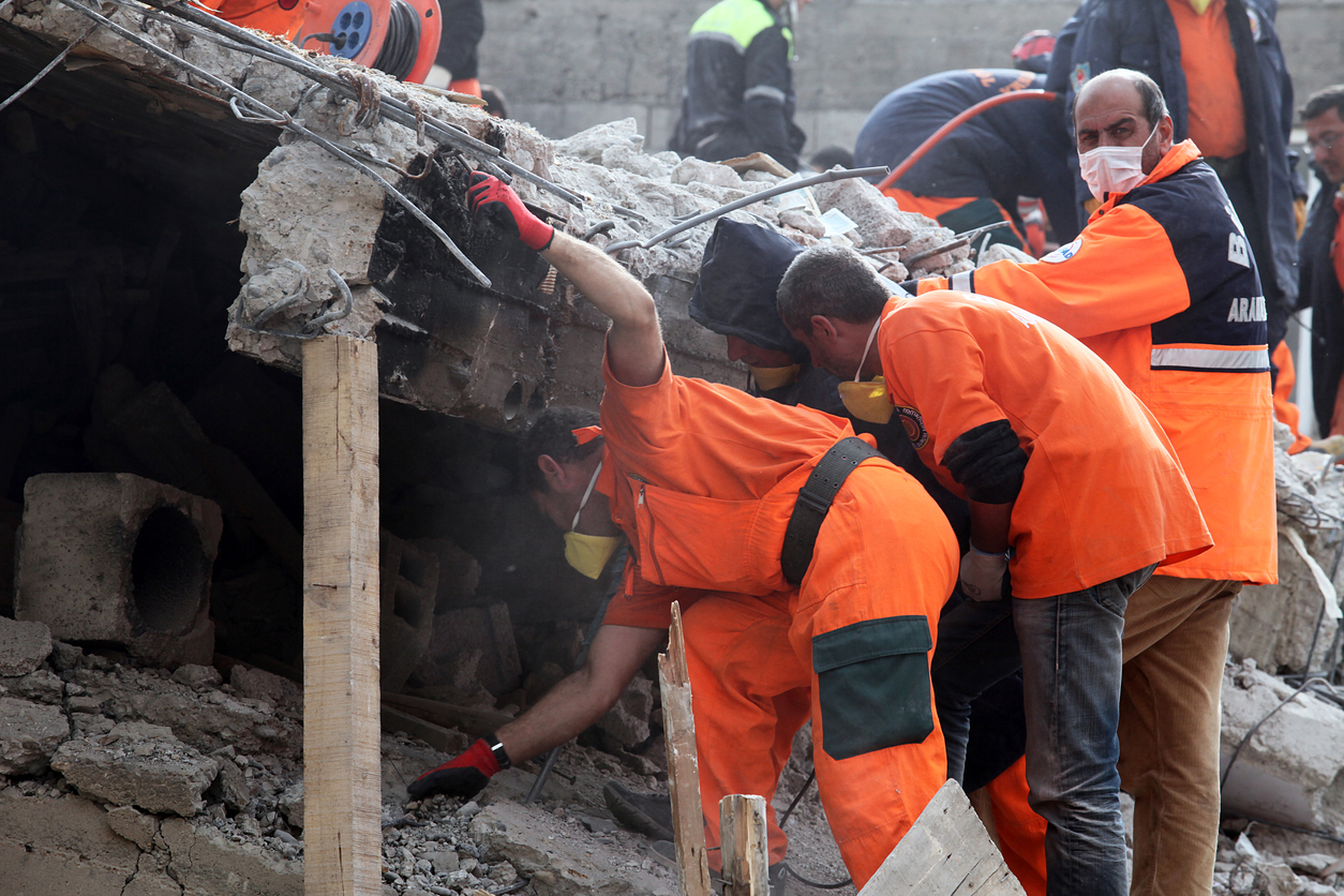 Rescue team is searching for the wounded under the debris after the earthquake